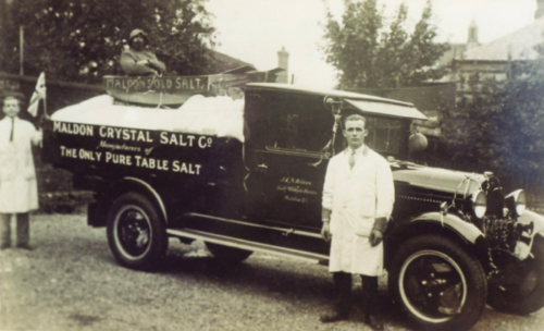 Historic photo of Maldon Salt workers posing next to salt truck