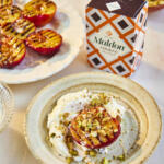 Grilled plums paired with Greek yogurt, honey and pistachios. Seasoned with Maldon Smoked Sea Salt 125g pack.