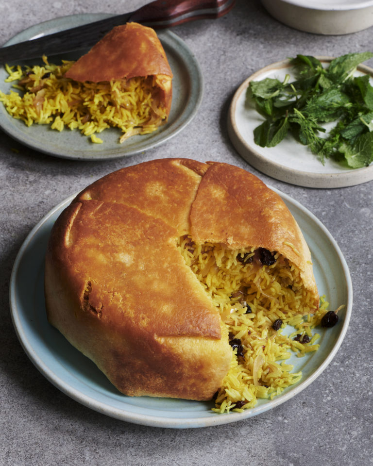 Olia Hercules Pilau Pie on plates on a table