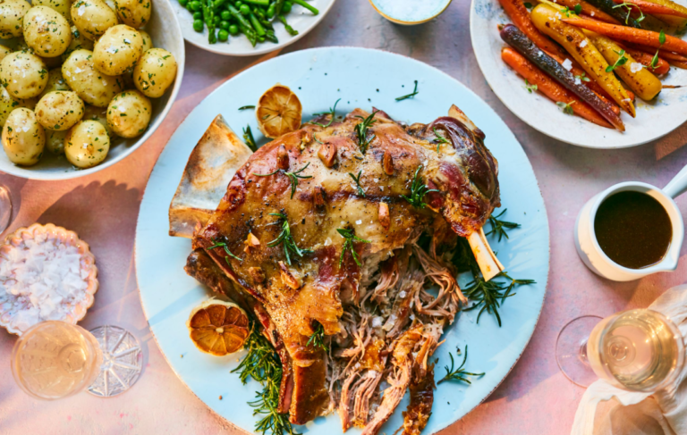 Slow cooked lamb shoulder amongst seasonal vegetables