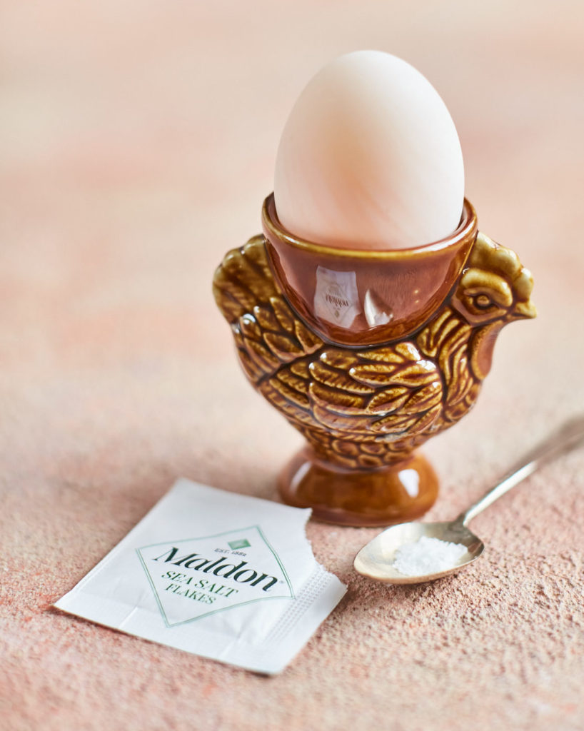 Maldon Salt sachet next to boiled egg in egg cup