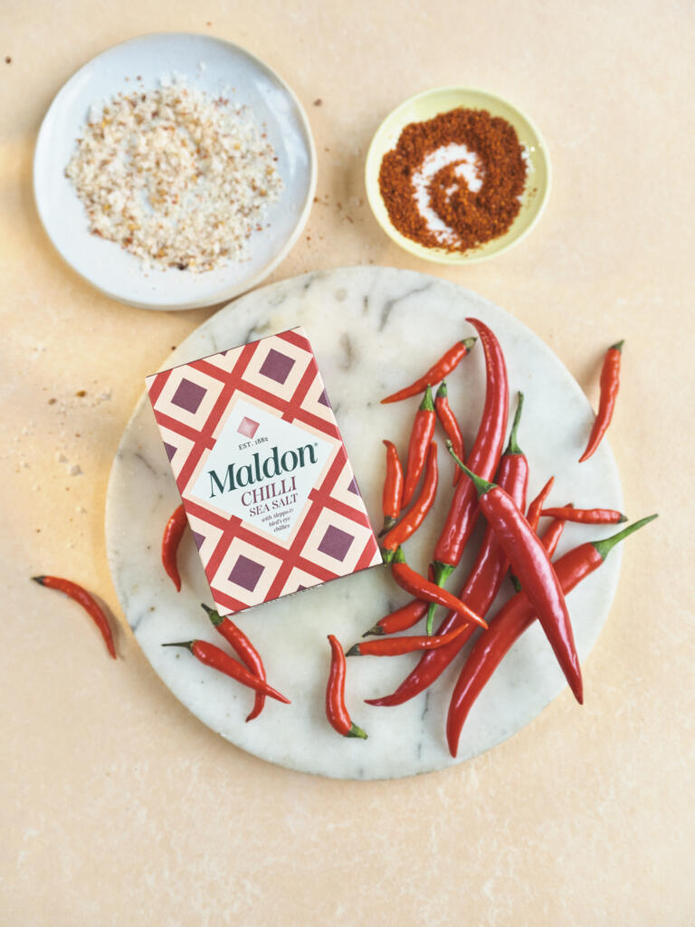 Maldon Chilli Sea Salt 100g pack. Paired with bird's eye chillies and Aleppo peppers.