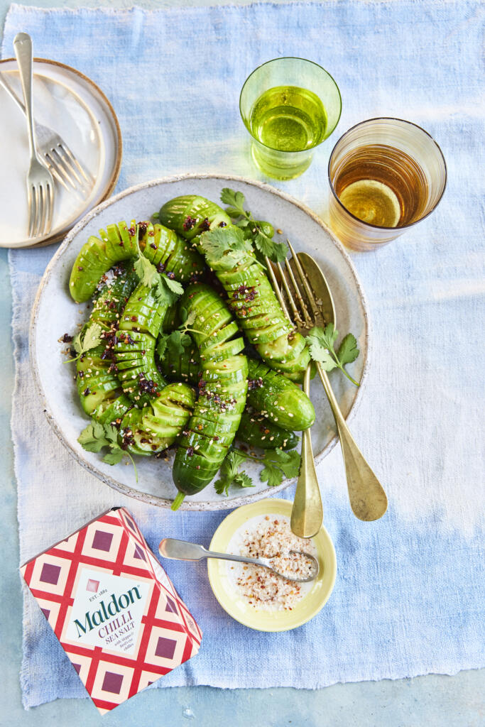 Hasselback-style spicy cucumber salad. Seasoned with Maldon Chilli Sea Salt 100g pack.