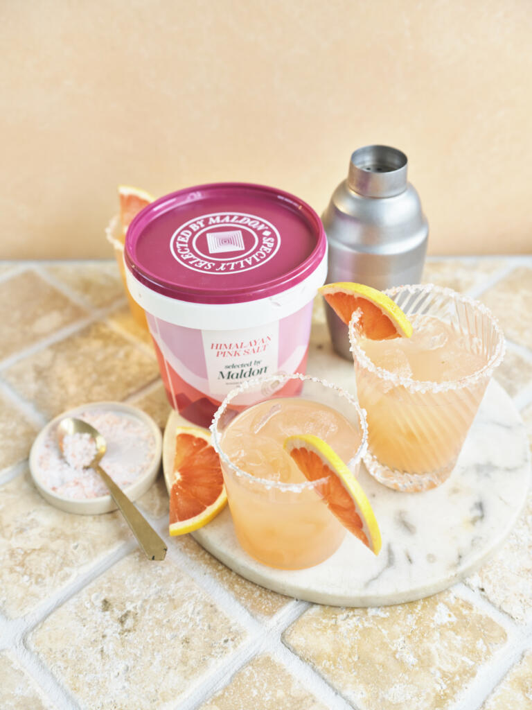 Paloma cocktail with a pink salt rim from Himalayan Pink Salt, Selected by Maldon. 1kg tub format.