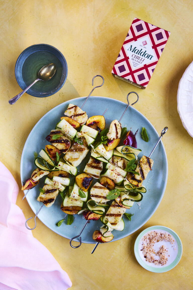 Halloumi skewers paired with spiralled courgettes and nectarine sliced, seasoned with Maldon Chilli Sea Salt and honey.