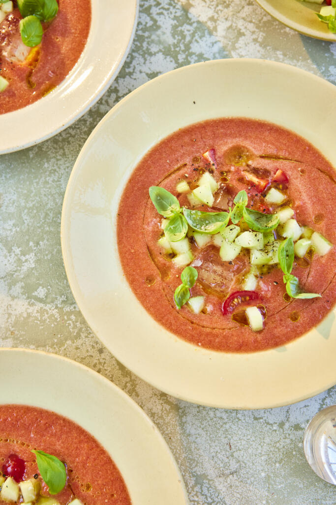 Tomato gazpacho paired with onion, red pepper, garlic and cucumber. Drizzle with olive oil and a pinch of basil and Maldon Chilli Sea Salt.