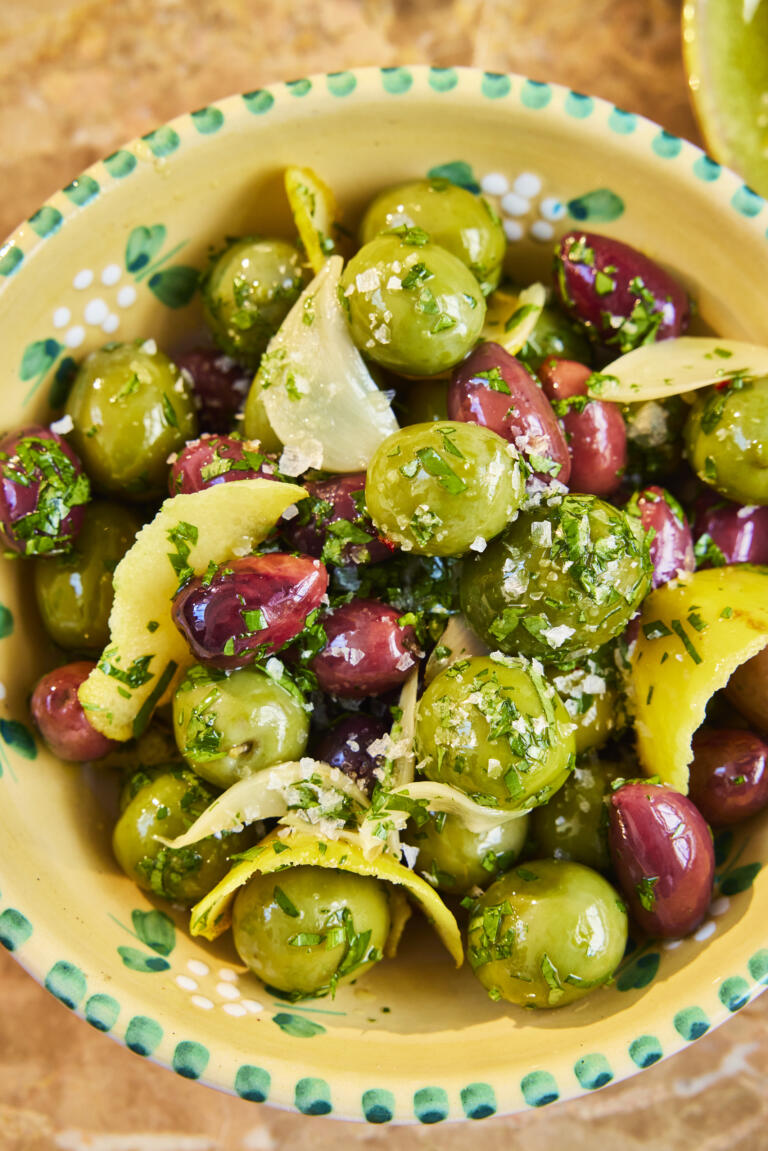 Easy marinated olives made with olive oil, lemon, garlic, chilli flakes, parsley and a pinch of Maldon Sea Salt flakes.