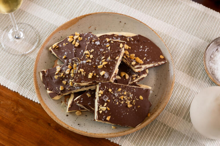Close-up of chocolate bark broken into pieces, each with a layer of ice cream inside.