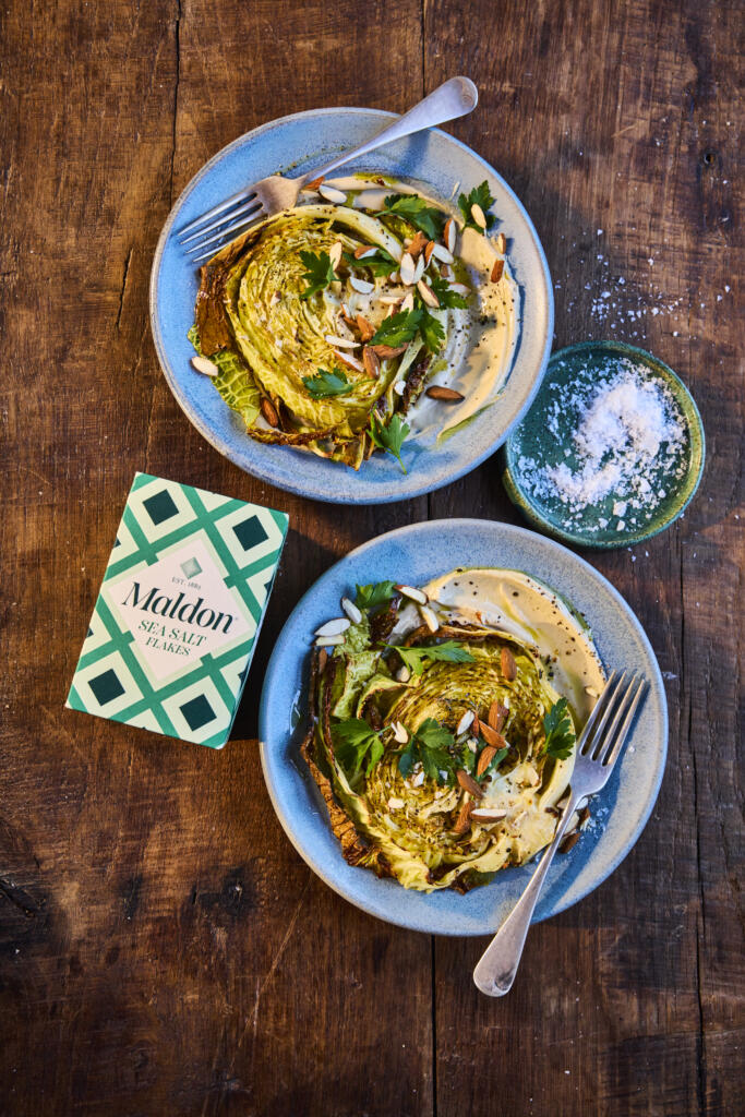 plated savoy cabbages with tahini and nuts