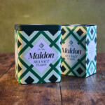Gift Tin and 250g pack in a green background